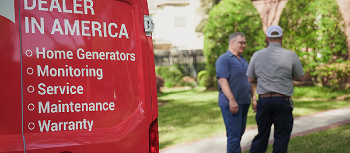 A Generator Supercenter technician talking toa homeowner who just purchased a whole home Generac Generator from Generator Supercenter.